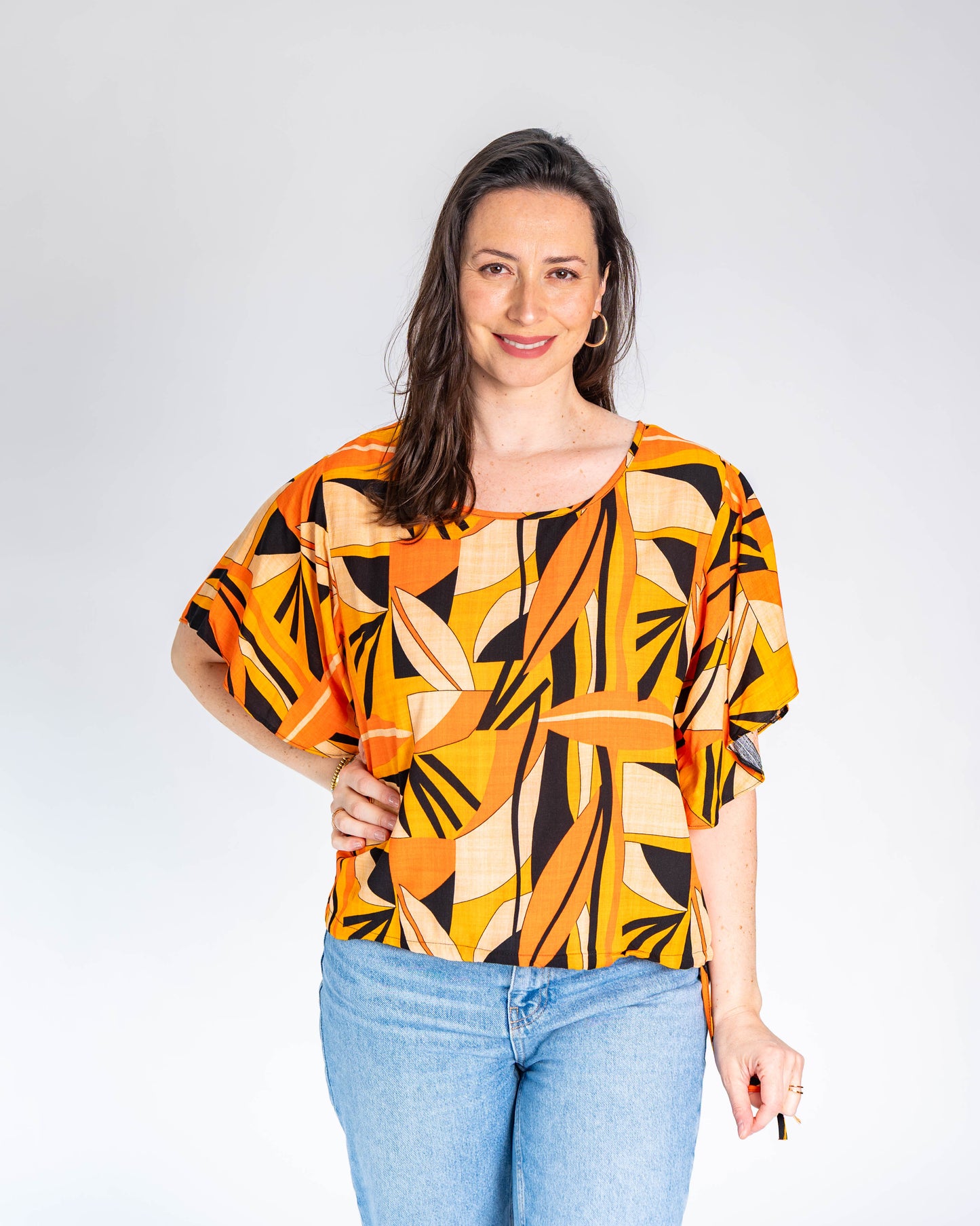 Polera BR Tatiana Figuras Naranja