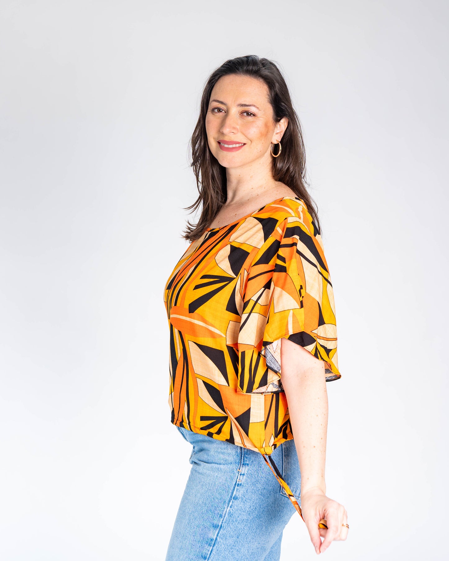 Polera BR Tatiana Figuras Naranja