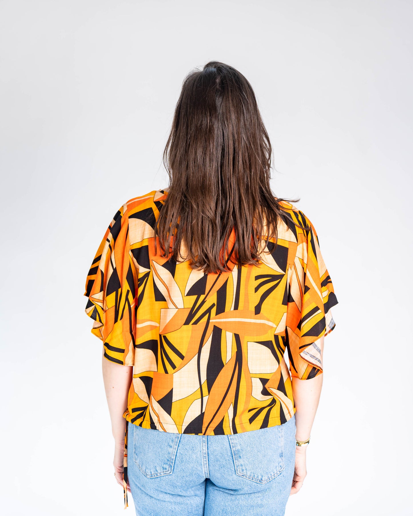 Polera BR Tatiana Figuras Naranja
