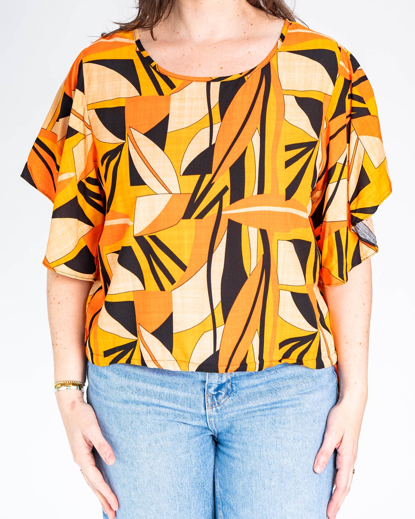 Polera BR Tatiana Figuras Naranja