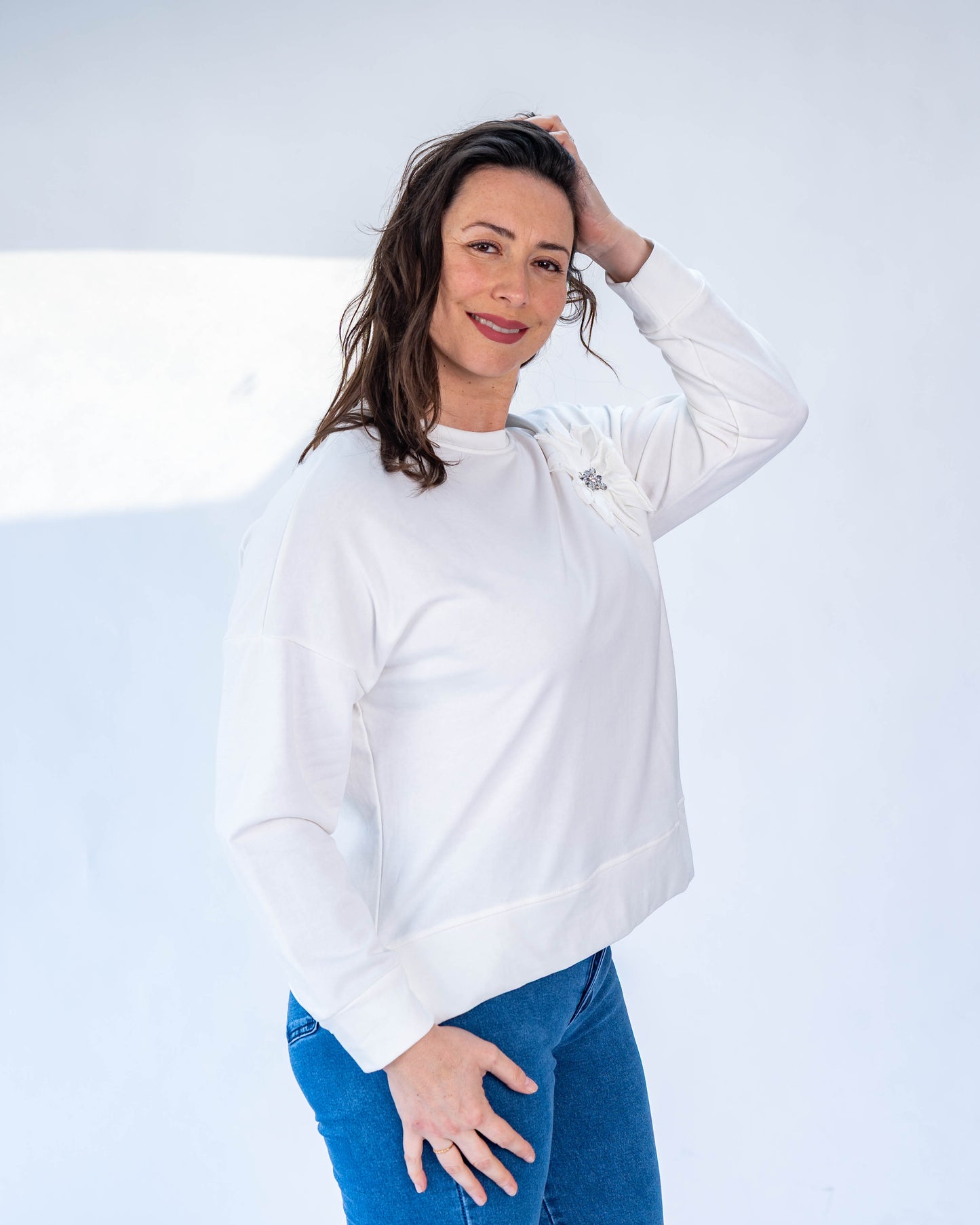 Polerón flor blanco