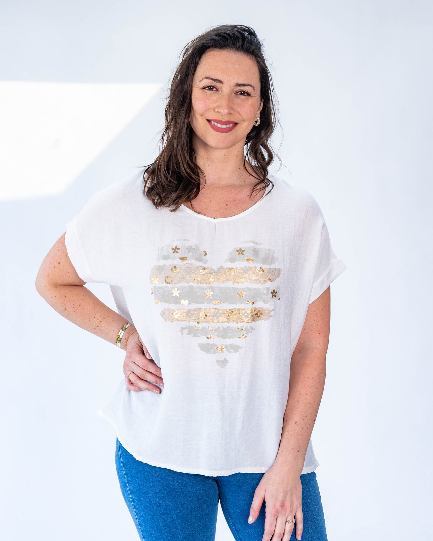 Polera hilo flores doradas