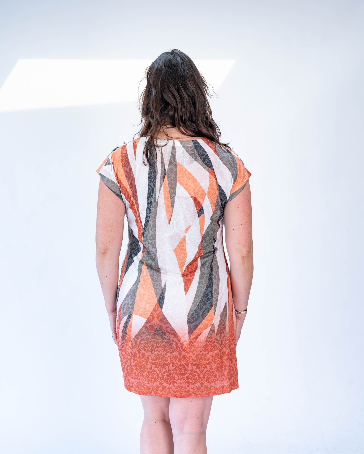 VESTIDO VALENTINA FIGURAS NARANJAS