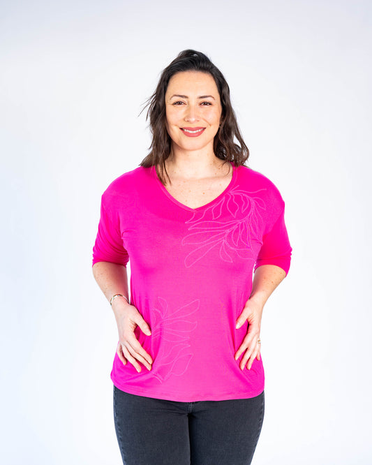 Polera flor fucsia