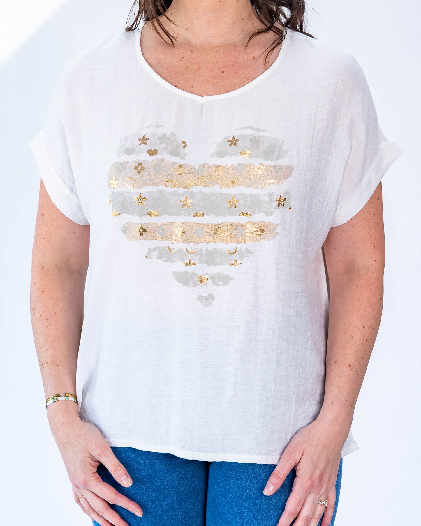 Polera hilo flores doradas
